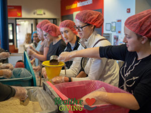 Health-e Giving - Feeding Children Everywhere Event Assembly Line