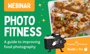 Graphic titled “Photo Fitness” with the phrase “A guide to improving food photography,” featuring a close-up photo of pizza slices and a cartoon camera character, branded by Pisanick Partners and Health-e Pro, promoting School Food Photography.